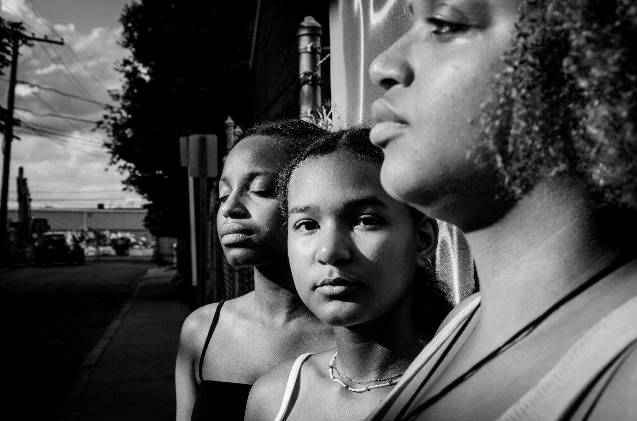 A black and white photograph of three women, by Kristen Emack.