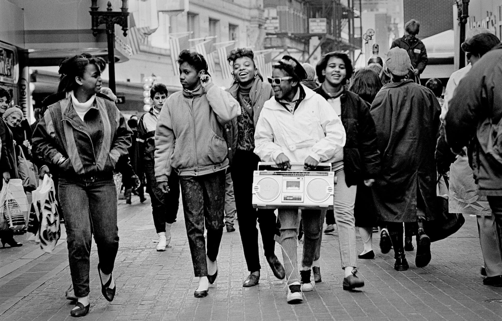 Image of "Young women with boombox in Downtown Crossing, 1986" by John Nordell