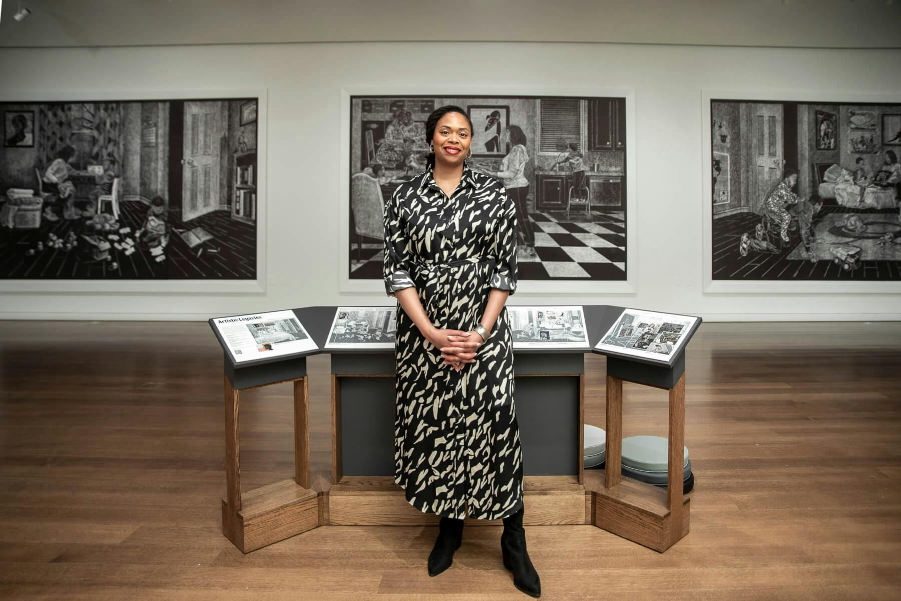 The artist stands in front of her work at the Harvard Art Museums.