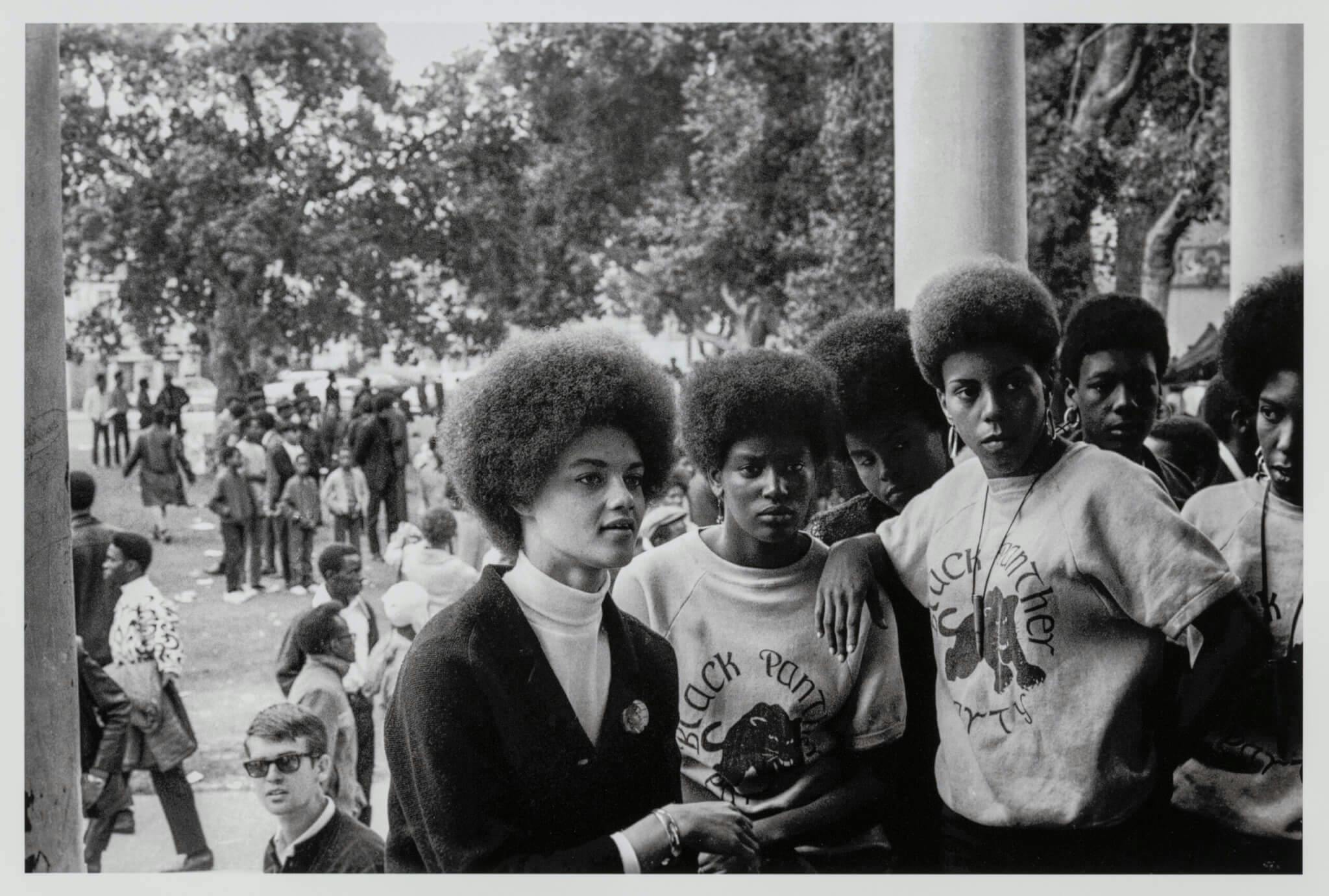 Young women of the Black Panthers Party gather at a rally.