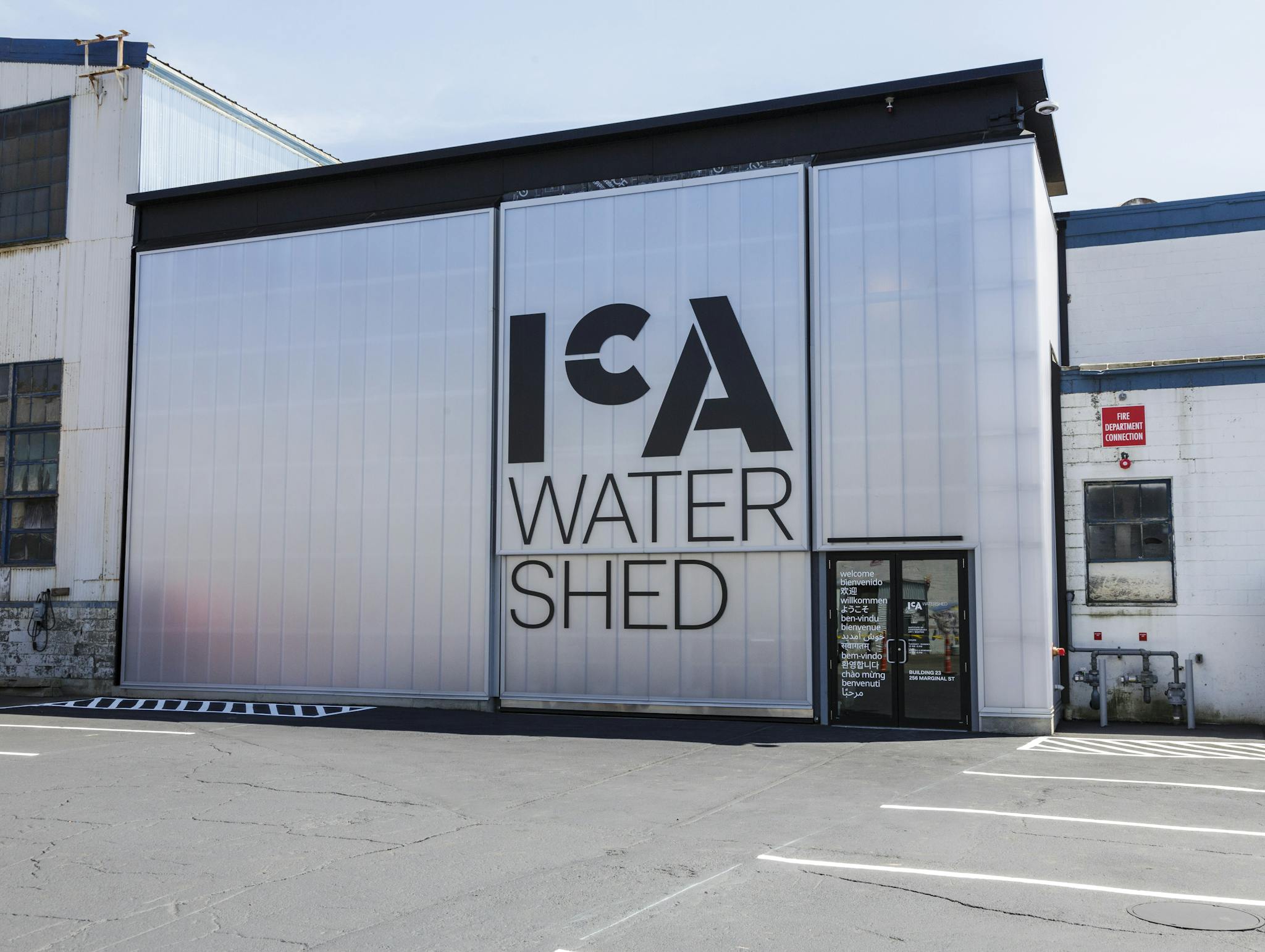 The exterior of the ICA Watershed, featuring lettering on the front of the strucutre, and an entrance.