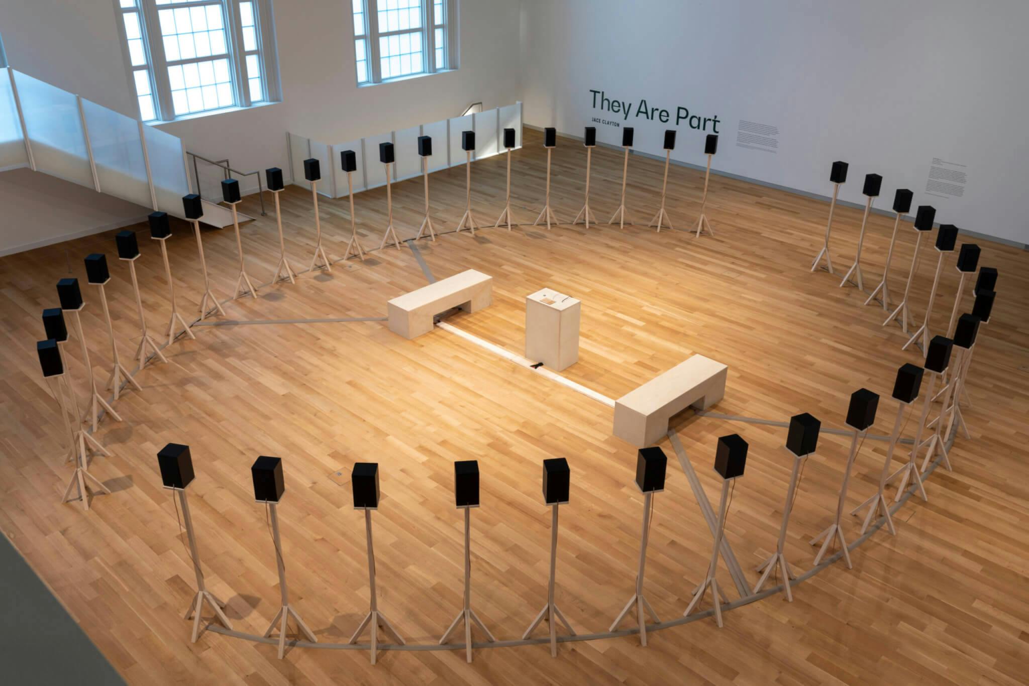 Installation image of "Jace Clayton: They Are Part" at MassArt Art Museum.