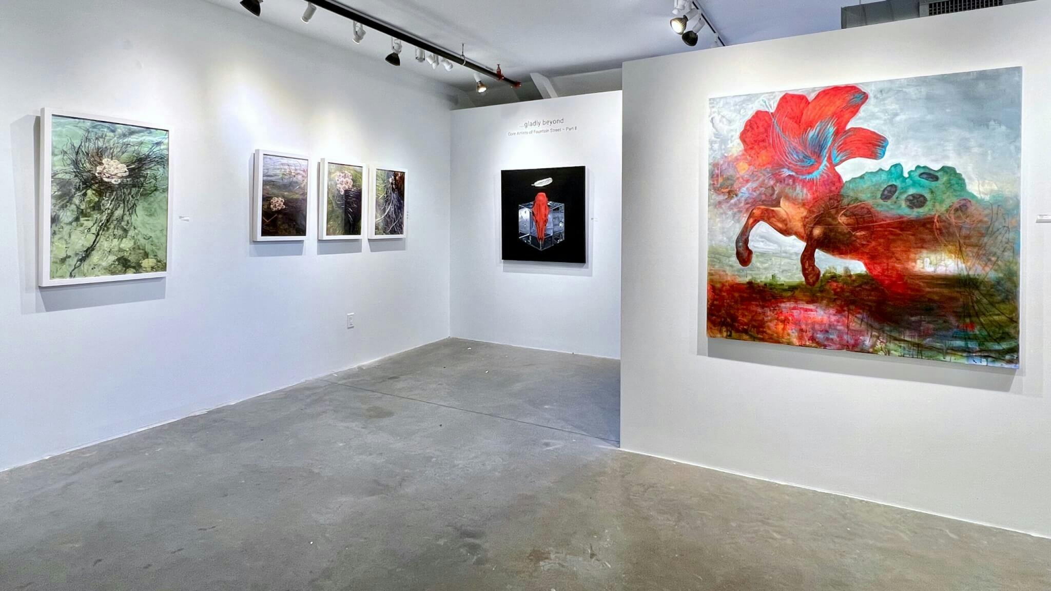 On a white wall positioned in the center hangs Dalvin Byron's singular work, flanked by four of Miller Opie's to the left, and one of Sandra Cohen's in the right foreground.
